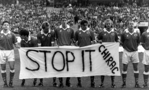 The Swiss national team with banner protesting French atomic bomb testing, at their game against Sweden in the autumn of 1995.