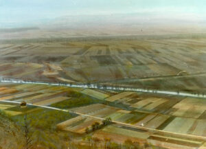 View from Mont Vully over the Great Marsh with the Broye Canal, coloured photo by Leo Wehrli, 1942.