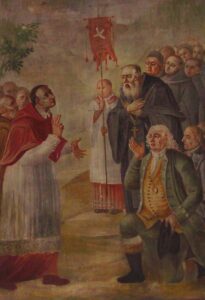 Le prince-abbé Christian von Castelberg (l’homme avec la croix pectorale) reçoit en 1581 le cardinal milanais et contre-réformiste Charles Borromée (à gauche) à Disentis.