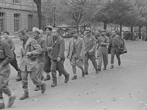 Arrivée à Berne à l’automne 1944 des partisans ayant fui les vallées de l’Ossola. Ils furent ensuite transférés dans différents camps d’internement.