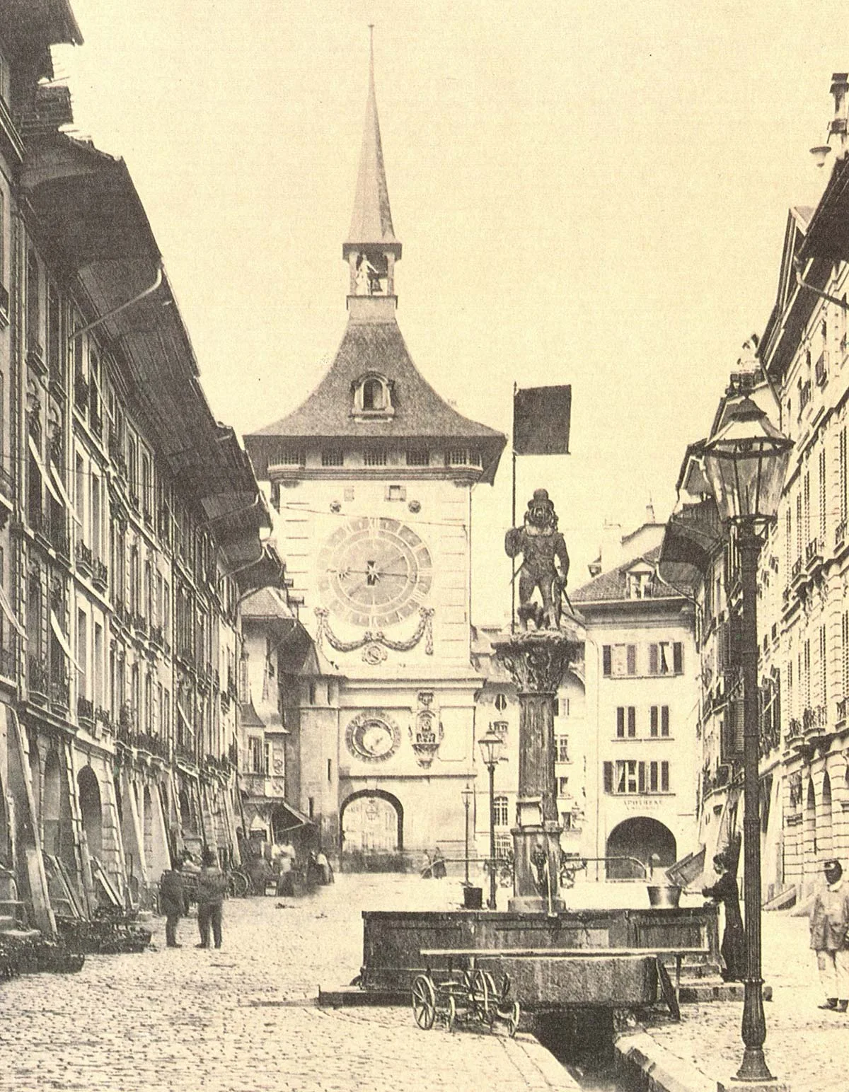 Kramgasse in Bern, photographed before 1890. The gas lamps that lit the street at the time are clearly visible.