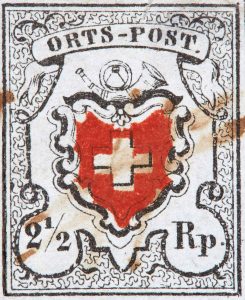 Local postage stamp from 1850 with a value of two and a half centimes. This stamp allowed a letter to be mailed within the local area.