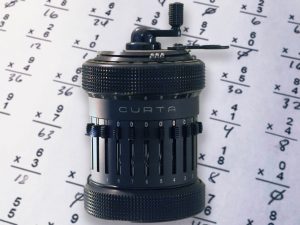 Mechanical pocket calculator: A Curta Type II, constructed from 1953 onwards.