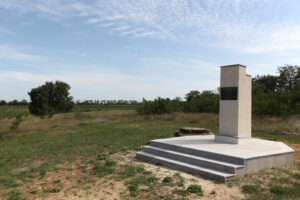Monument at the site of the Swiss settlers’ cemetery in Shabo, 2012. Vineyards in the background.