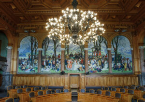 Symbolic reminder of the pre-modern democratic institutions in the chamber of the Council of States. “Die Landsgemeinde” mural by Albert Welti and Wilhelm Balmer, 1917.