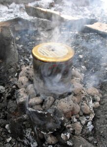 Modern experimental attempt to produce birch pitch in a single-pot process: the birch bark is carbonised in a vessel under airtight conditions.