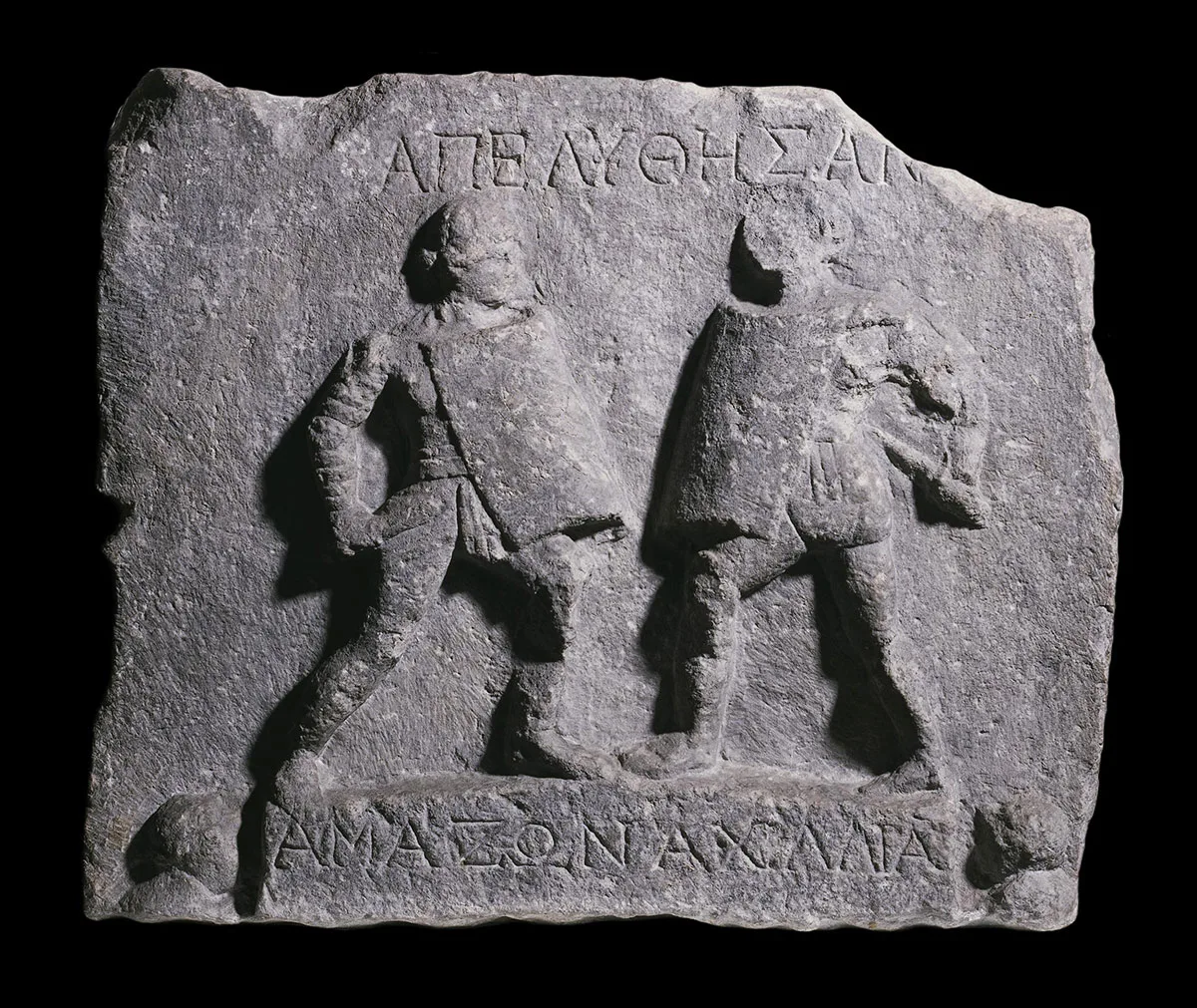 A marble relief from Halicarnassos (Turkey) shows a gladiatorial duel.