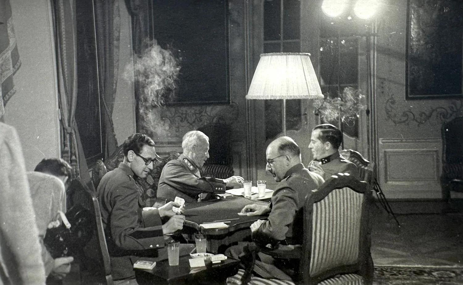 Cards, cigarettes and Pernod: General Guisan and three members of his personal staff at the games table in the main room.