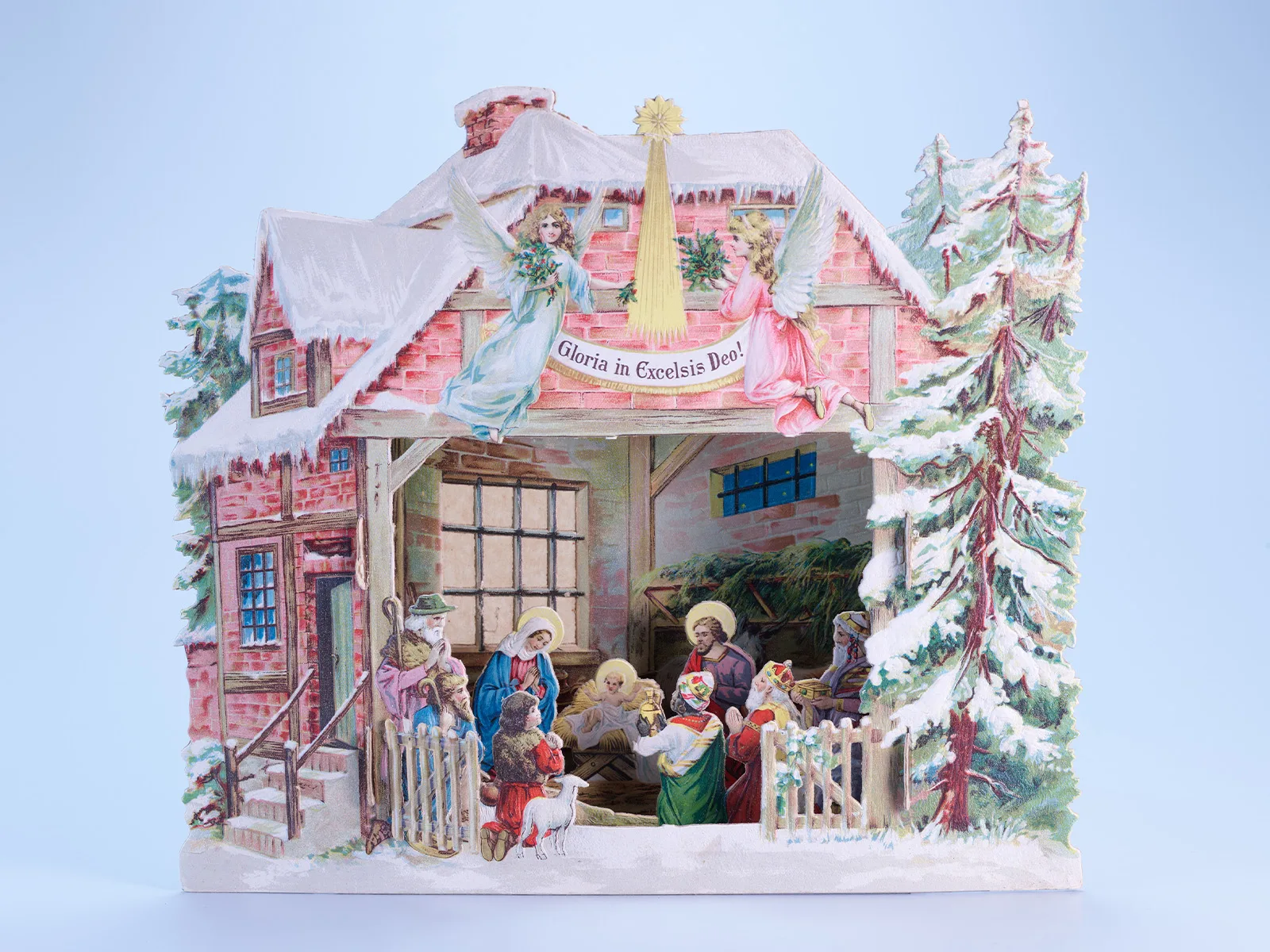 Findet die Geburtsszene in einem Haus statt, erhält das Gebäude in Krippenszenen meistens das lokale Aussehen. So auch in diesem Beispiel aus Deutschland von 1920. Die Faltkrippe aus dem Spielzeug Welten Museum Basel zeigt ein Riegelhaus mit roten Backsteinen.