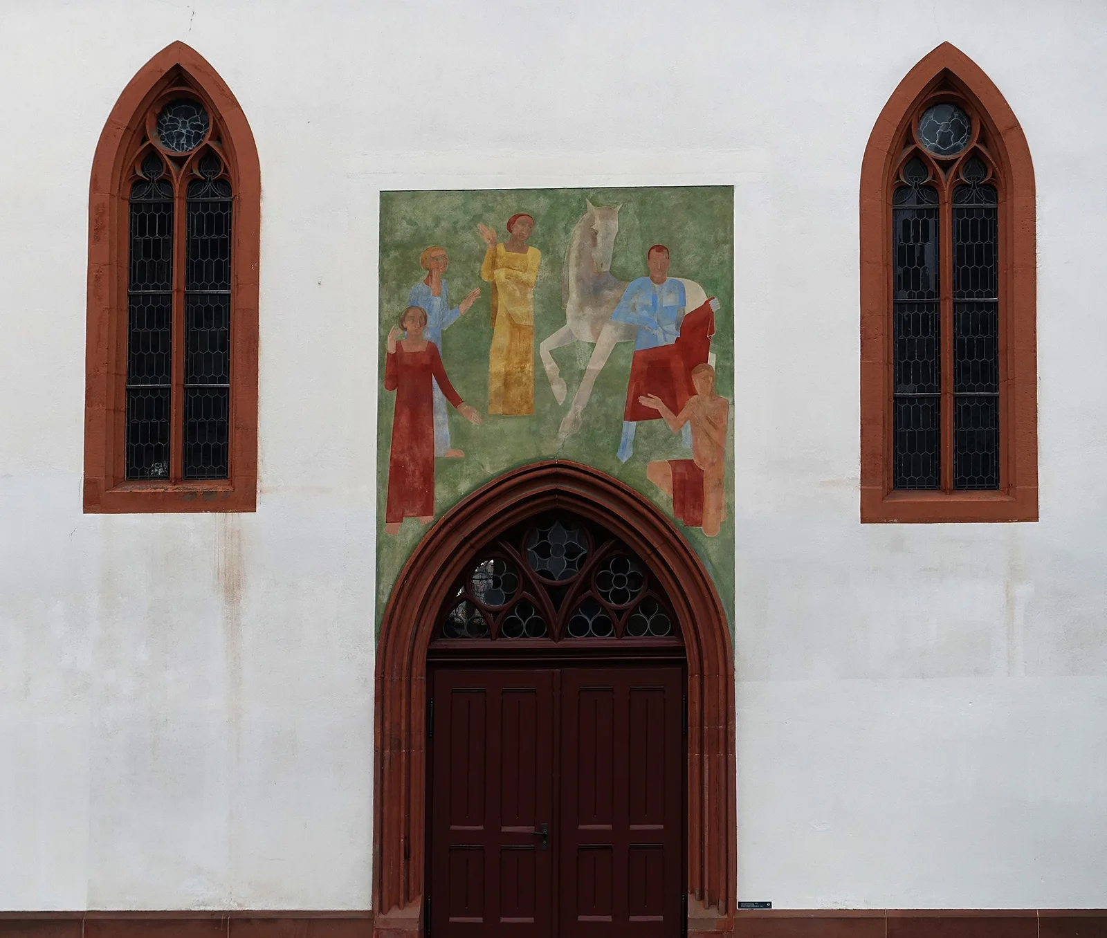 Hans Friedrich Rohner Wandbild der Martinslegende über dem Südportal der reformierten Martinskirche in Basel