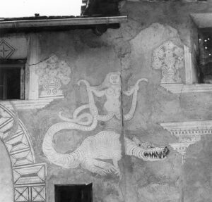 Melusine playing with the dragon’s tail: mythical creatures occasionally escape the written word to adorn building walls, where they fire the imagination and encourage their sagas’ retelling. Sgraffito on a house in the Engadin village of Cinuos-chel.