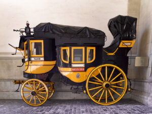 Gotthard stagecoach from 1850 standing in front of the National Museum Zurich.