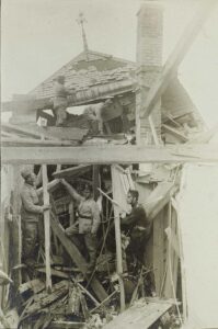Damaged house in Porrentruy after the bombing in April 1917.