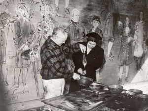 Raoul Dufy and photographer Thérèse Bonney at work on the fresco “La Fée Electricité”, 1937.