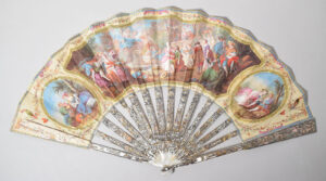 Rococo fan made of silk, embroidered with sequins, with sticks made of mother-of-pearl with motif appliqués in silver and bronze, France, c. 1770.
