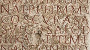 Detail of an inscription in Latin on a former altar stone dedicated to the Celtic horse goddess Epona.