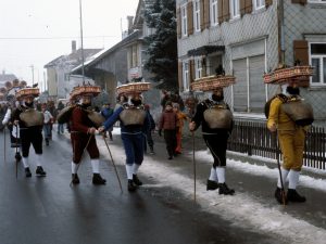 ‘Schöne’ Silvesterkläuse, or New Year mummers, doing the rounds in Urnäsch, sometime between 1975-1985.
