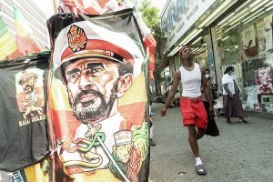 T-shirts featuring Haile Selassie for sale in Harlem, New York, 2021.
