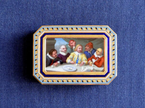 Gold tobacco box “The Egg of Columbus” with enamel painting on the lid.