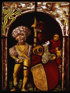 A stained glass coat of arms of the mercenary leader Ulrich, Freiherr von Hohensax, from the Lachen Town Hall, 1507.