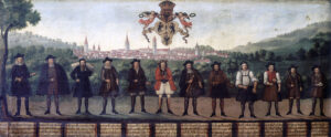 With the city in the background, you can see twelve representatives of professions involved in the linen trade – from the salesman at the top to the cellarman responsible for producing the barrels to transport the material.